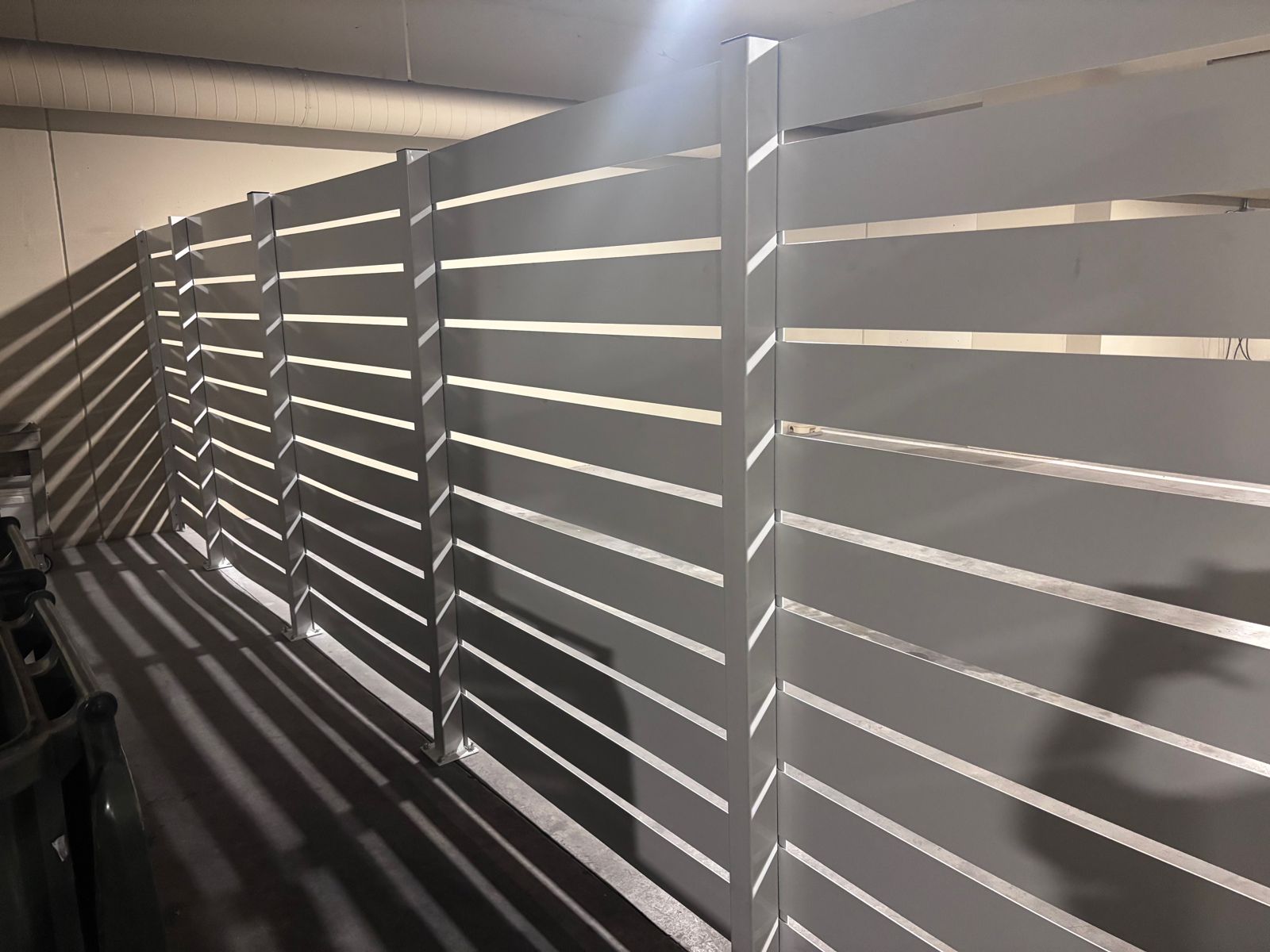 Replacement fence pickets and rails installed on a DFW property