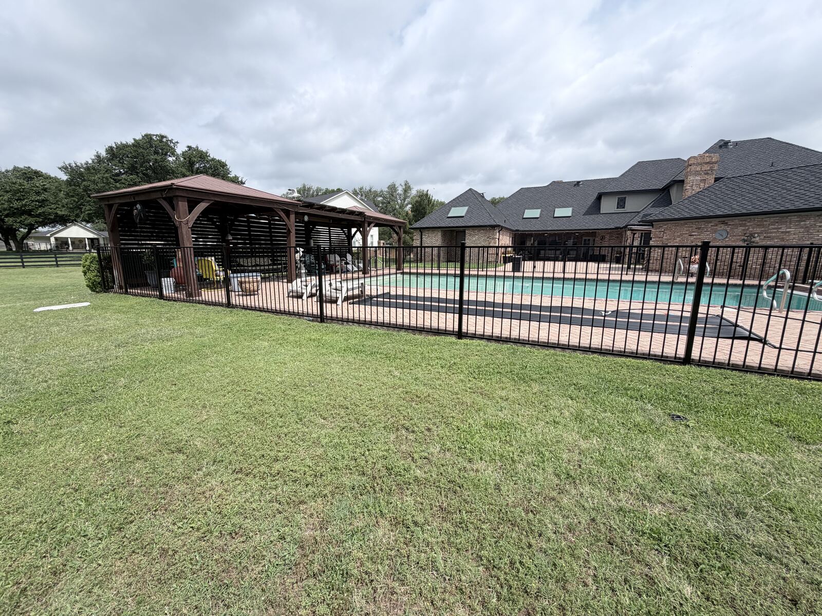 Black wrought iron fence installed in Fort Worth, TX